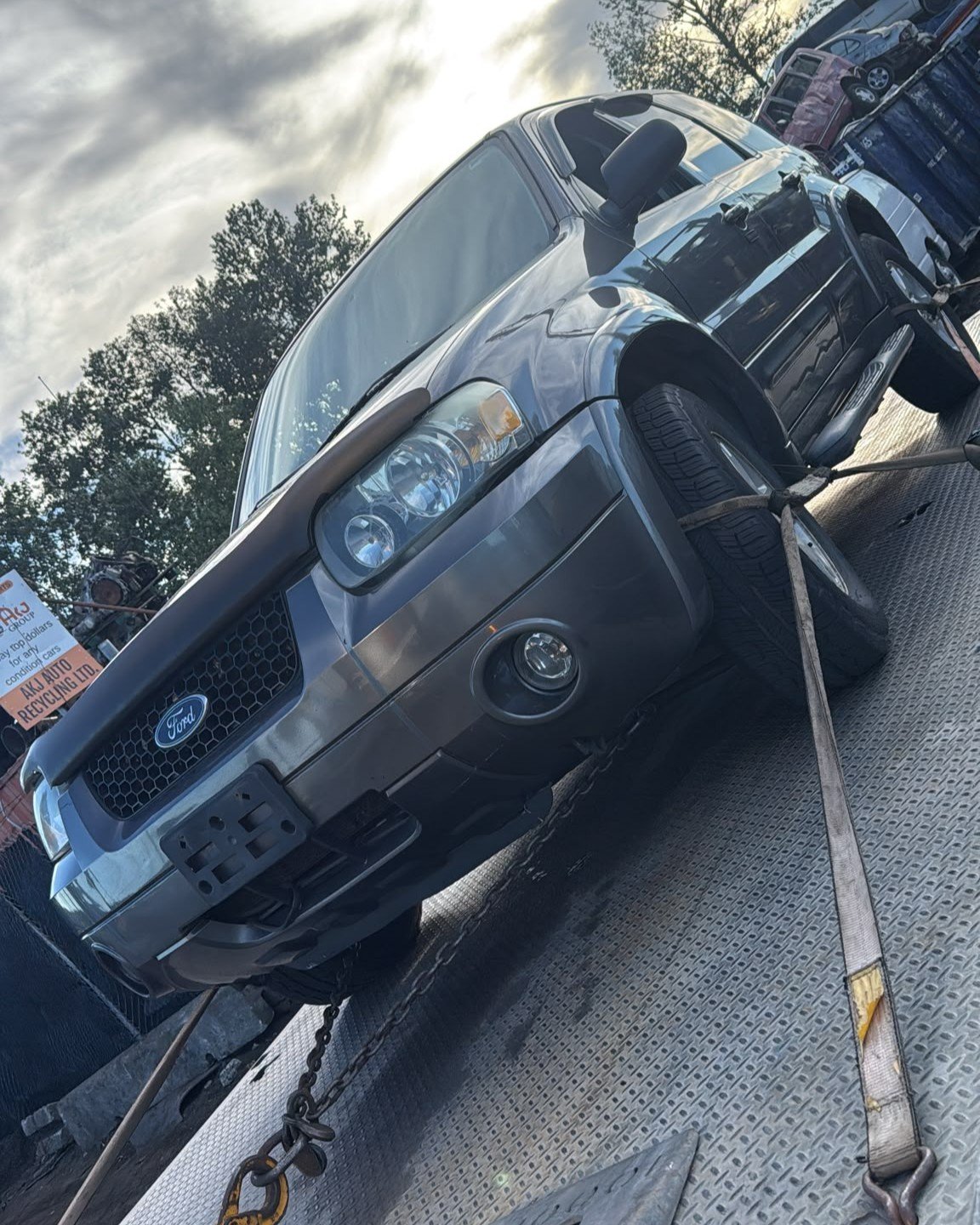Junk car loaded for free removal in Vancouver